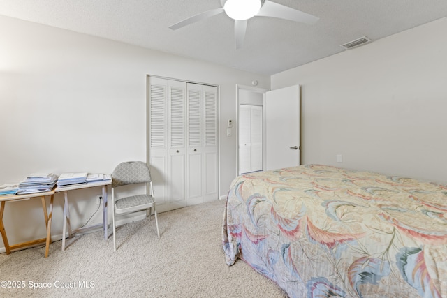 1700 Neptune Dr, Merritt Island, FL 32952 - bedroom with carpet floors, ceiling fan, and a closet