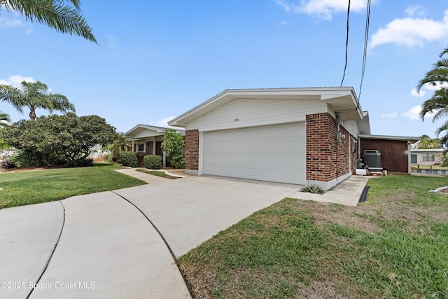 1700 Neptune Dr, Merritt Island, FL 32952 - ranch-style house featuring brick siding, a garage, concrete driveway, a front lawn, and central air condition unit