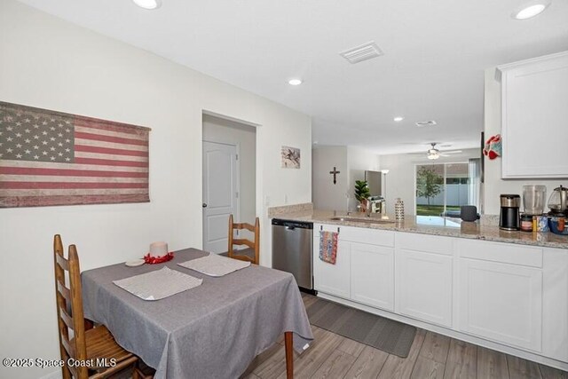 966 Stage St SE, Palm Bay, FL 32909 - dining space featuring wood finished floors, recessed lighting, and a ceiling fan