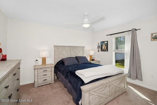 966 Stage St SE, Palm Bay, FL 32909 - bedroom featuring light carpet, baseboards, and ceiling fan