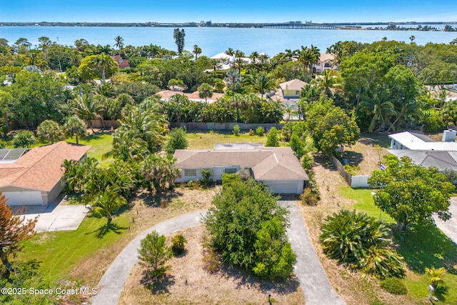 aerial perspective of suburban area featuring a large body of water
