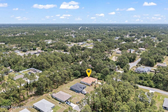 471 Hallmark St SE, Palm Bay, FL 32909 - aerial view of property and surrounding area with a heavily wooded area and nearby suburban area