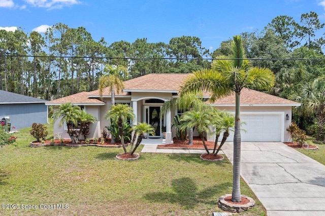 471 Hallmark St SE, Palm Bay, FL 32909 - view of front of home with an attached garage, stucco siding, concrete driveway, a front lawn, and a shingled roof