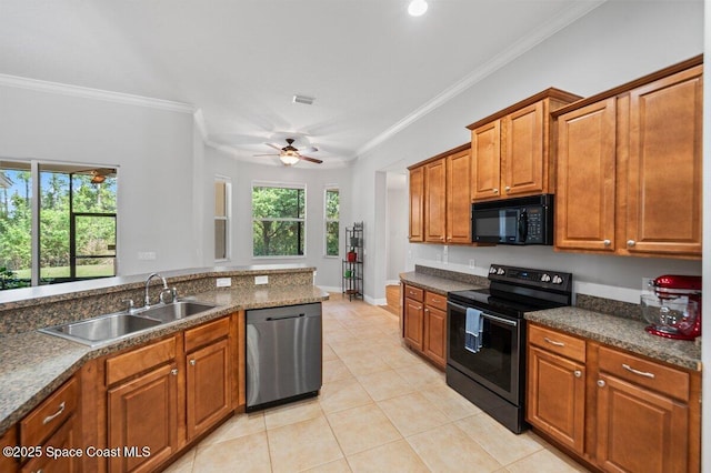 471 Hallmark St SE, Palm Bay, FL 32909 - kitchen featuring stainless steel appliances, a sink, ornamental molding, light tile patterned floors, and ceiling fan