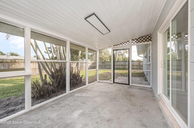 118 1st St, Merritt Island, FL 32953 - unfurnished sunroom with vaulted ceiling