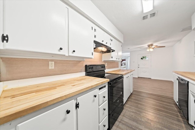 kitchen featuring electric range, under cabinet range hood, white cabinets, butcher block counters, and wood finished floors
