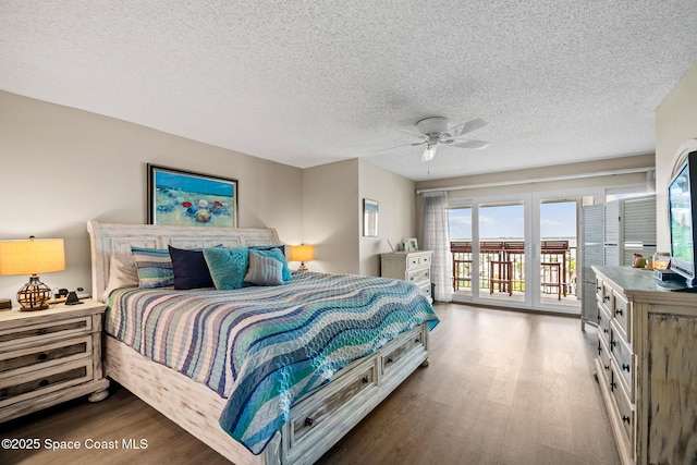bedroom with wood finished floors, access to outside, a textured ceiling, and a ceiling fan