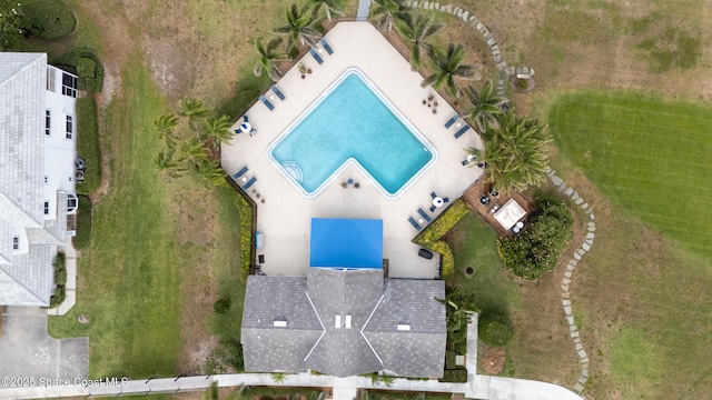 view from above of property with a pool area