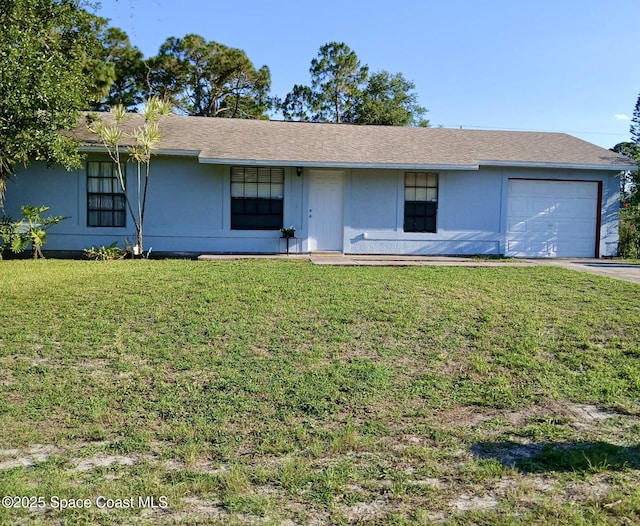 ranch-style home with an attached garage, a front lawn, and driveway