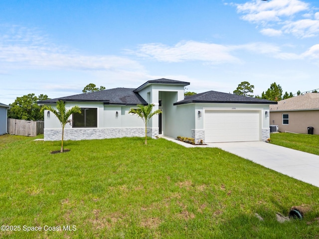 2990 Hackensack Ave SE, Palm Bay, FL 32909 - prairie-style home with stone siding, an attached garage, stucco siding, driveway, and cooling unit