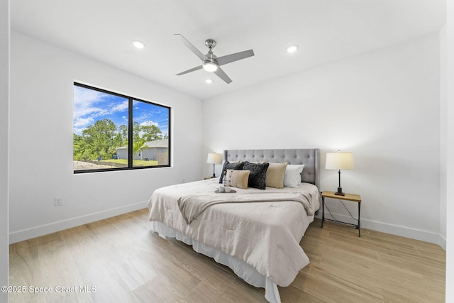 2990 Hackensack Ave SE, Palm Bay, FL 32909 - bedroom with light wood-style flooring, recessed lighting, and a ceiling fan