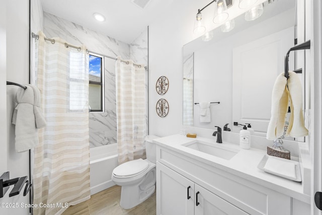 2990 Hackensack Ave SE, Palm Bay, FL 32909 - full bath featuring shower / tub combo, vanity, and wood finished floors