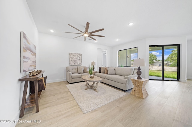 2990 Hackensack Ave SE, Palm Bay, FL 32909 - living area with light wood-style flooring, ceiling fan, and recessed lighting