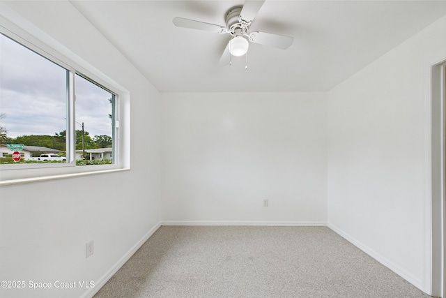 2341 Pawnee Dr, Melbourne, FL 32935 - unfurnished room featuring carpet floors, ceiling fan, and baseboards