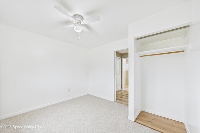 2341 Pawnee Dr, Melbourne, FL 32935 - unfurnished bedroom featuring baseboards, carpet floors, and a ceiling fan