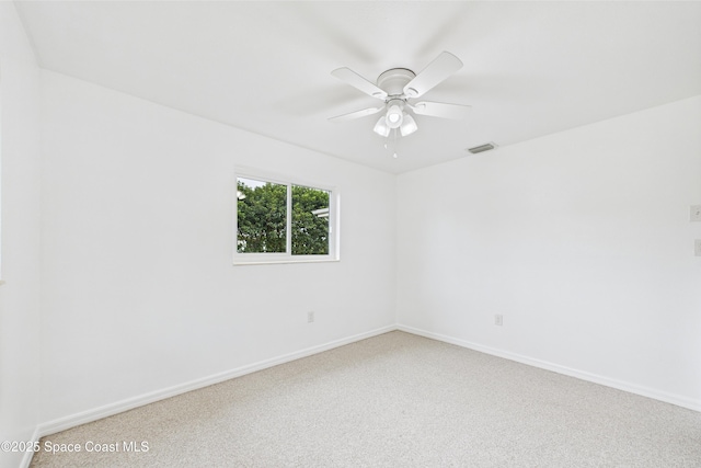 2341 Pawnee Dr, Melbourne, FL 32935 - carpeted spare room featuring a ceiling fan and baseboards