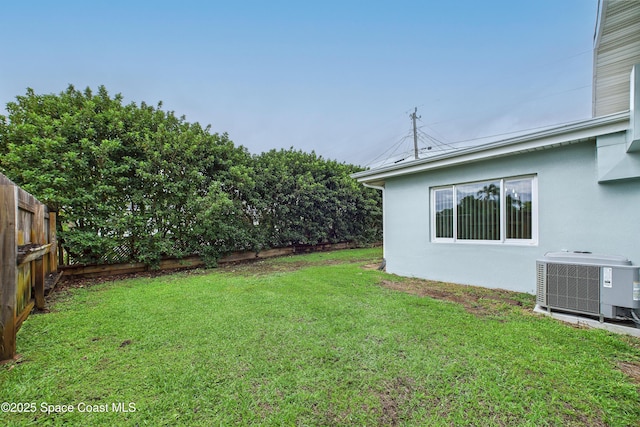 2341 Pawnee Dr, Melbourne, FL 32935 - view of yard with central AC