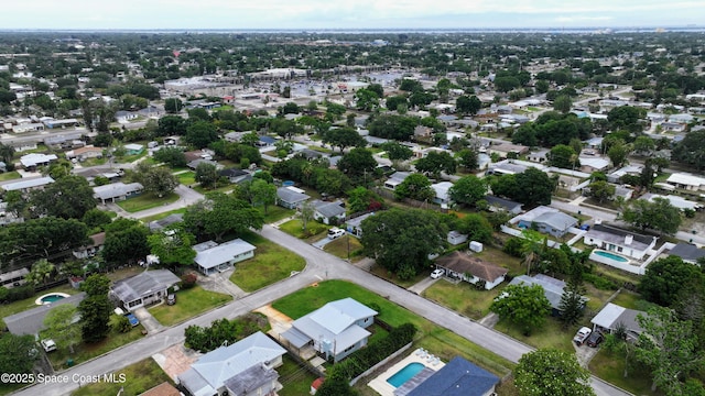 2341 Pawnee Dr, Melbourne, FL 32935 - aerial view of property's location with nearby suburban area