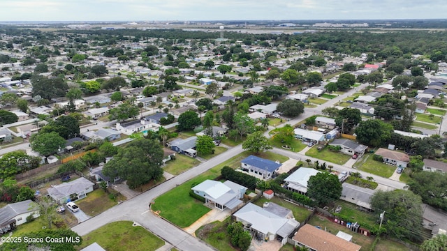 2341 Pawnee Dr, Melbourne, FL 32935 - aerial view of property and surrounding area featuring nearby suburban area