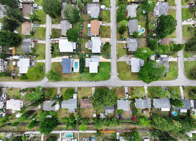 2341 Pawnee Dr, Melbourne, FL 32935 - aerial overview of property's location featuring nearby suburban area