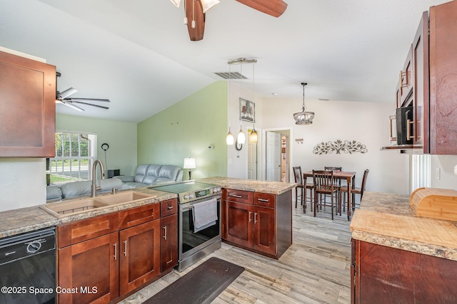 kitchen featuring ceiling fan, black dishwasher, a sink, lofted ceiling, and light wood-style floors