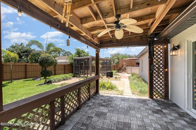 view of patio with a ceiling fan and a fenced backyard