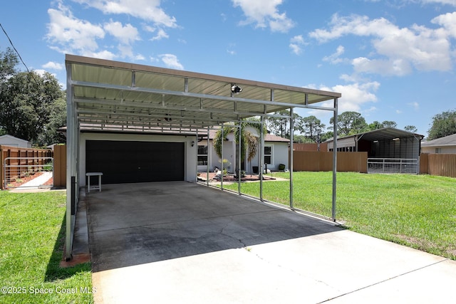 view of front of property with concrete driveway and a carport