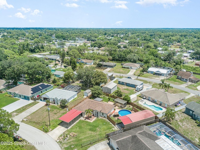 aerial perspective of suburban area with a pool area
