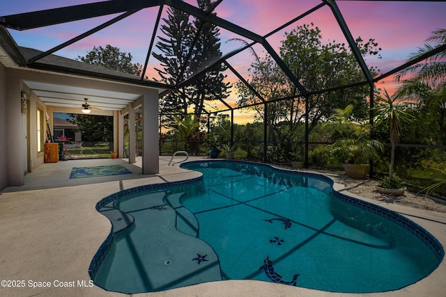 2127 Deercroft Dr, Melbourne, FL 32940 - pool at dusk with a patio, an outdoor pool, a ceiling fan, and glass enclosure