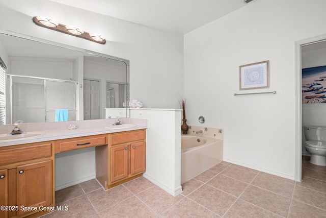 2127 Deercroft Dr, Melbourne, FL 32940 - full bath with tile patterned flooring, double vanity, toilet, a shower stall, and a bath