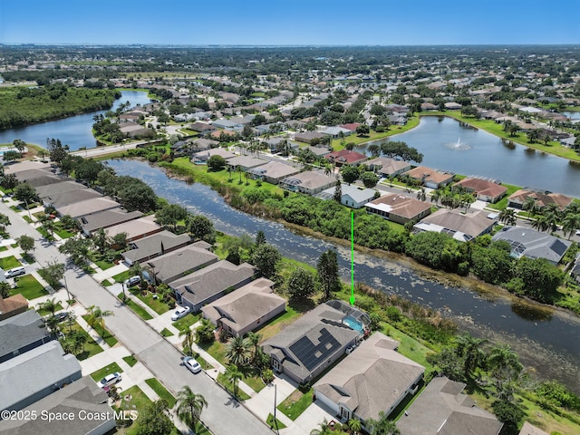 2127 Deercroft Dr, Melbourne, FL 32940 - aerial view of property and surrounding area featuring nearby suburban area and a large body of water