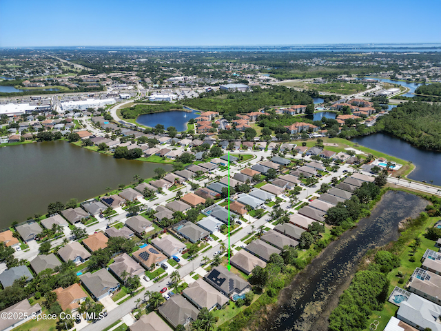 2127 Deercroft Dr, Melbourne, FL 32940 - aerial view of property's location with a large body of water and nearby suburban area