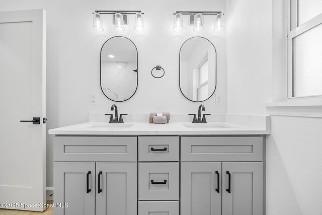 full bathroom featuring double vanity