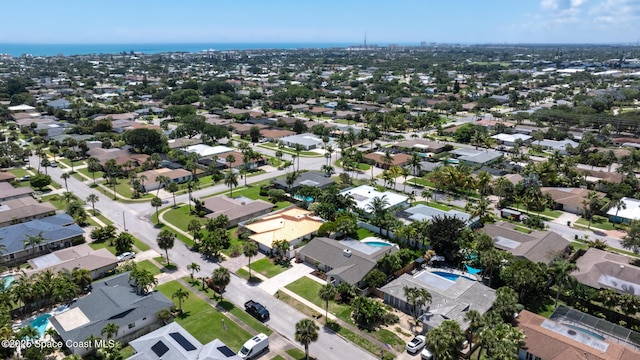 aerial view of property's location featuring nearby suburban area