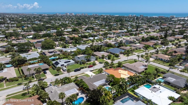 aerial perspective of suburban area featuring a large body of water