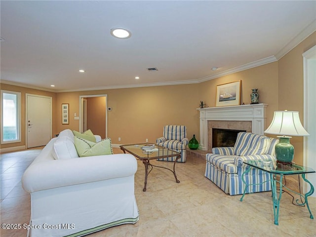 living room with ornamental molding, a fireplace, light tile patterned floors, recessed lighting, and baseboards