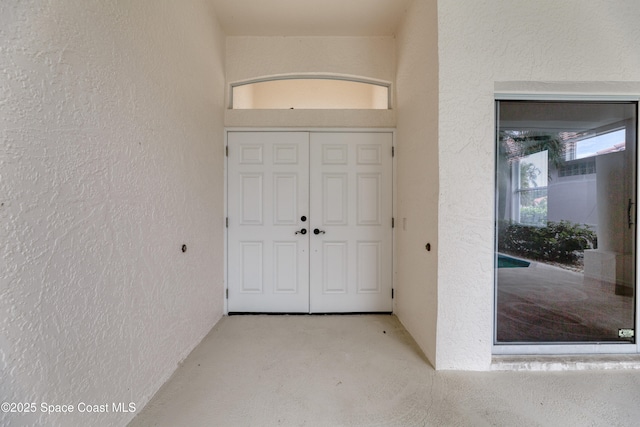 7433 Monterey Ct, Melbourne, FL 32940 - doorway to property with stucco siding