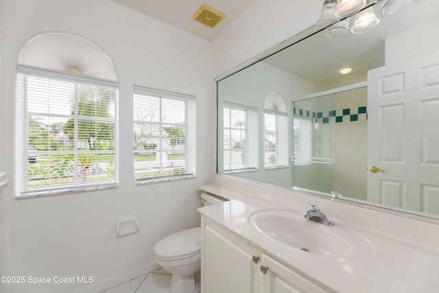 7433 Monterey Ct, Melbourne, FL 32940 - full bath with toilet, a shower stall, vanity, and tile patterned floors