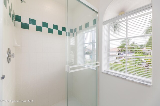 7433 Monterey Ct, Melbourne, FL 32940 - bathroom featuring a stall shower