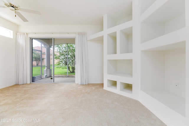 7433 Monterey Ct, Melbourne, FL 32940 - carpeted spare room featuring built in features and baseboards