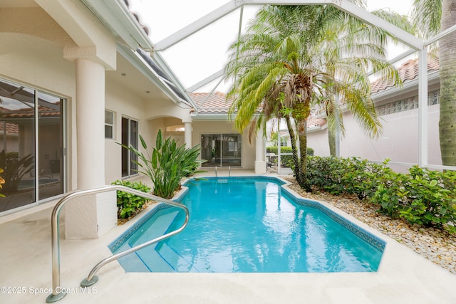 7433 Monterey Ct, Melbourne, FL 32940 - swimming pool featuring a lanai and a patio
