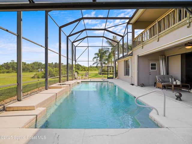 1013 Balmoral Way, Melbourne, FL 32940 - swimming pool with a patio, an outdoor living space, a lanai, and a yard
