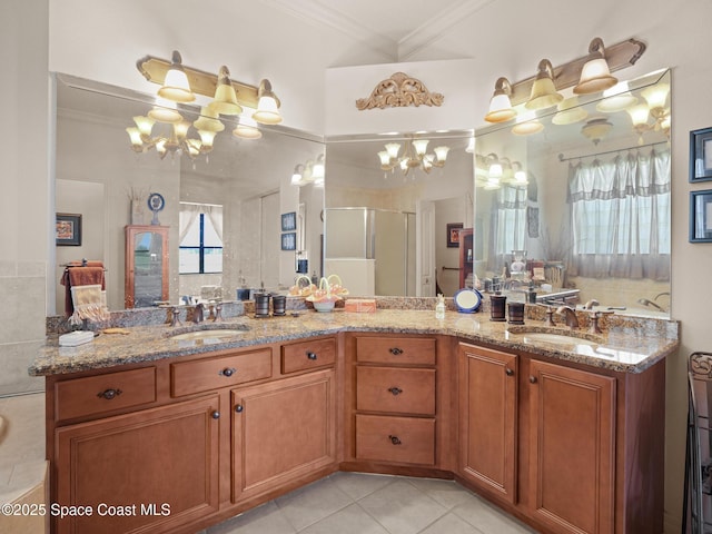 1013 Balmoral Way, Melbourne, FL 32940 - full bathroom featuring a chandelier, crown molding, a stall shower, double vanity, and tile patterned flooring