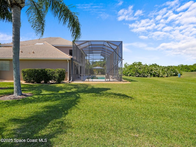 1013 Balmoral Way, Melbourne, FL 32940 - view of grassy yard with an outdoor pool, glass enclosure, and a patio area