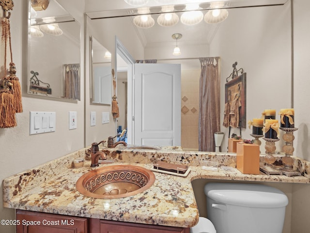 1013 Balmoral Way, Melbourne, FL 32940 - full bathroom with toilet, vanity, ornamental molding, and a shower with curtain