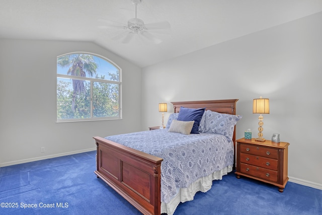 bedroom with dark carpet, vaulted ceiling, baseboards, and ceiling fan
