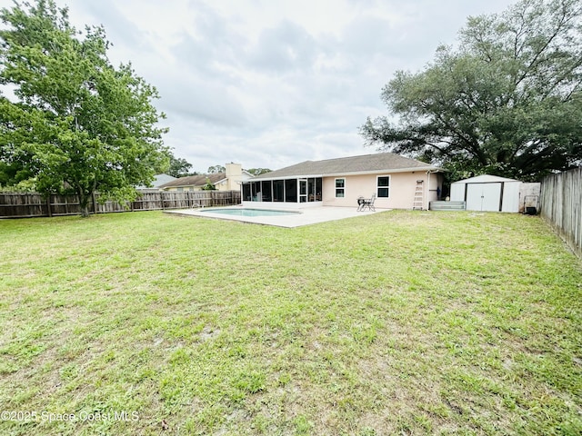 164 Bayamo Ave NE, Palm Bay, FL 32907 - back of house with a sunroom, a storage shed, a patio area, an outbuilding, and stucco siding