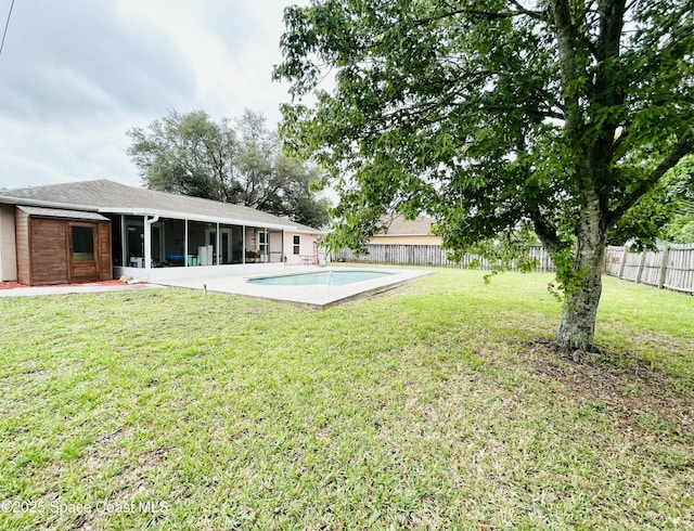 164 Bayamo Ave NE, Palm Bay, FL 32907 - back of house with a sunroom