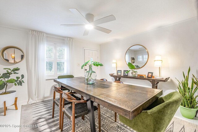 847 W Virginia St, Cocoa, FL 32927 - dining room featuring a ceiling fan and baseboards