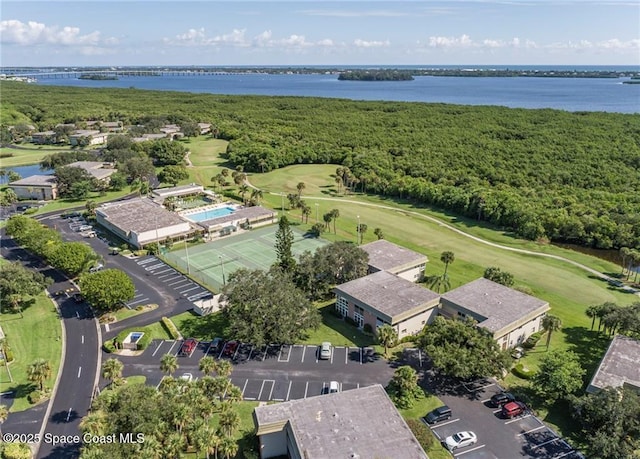 bird's eye view of a large body of water and a local golf course